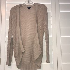 A beige knit long sweater